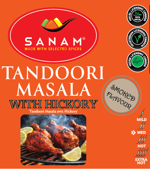 Packaging of Sanam Tandoori Masala with Hickory. The package is orange, with product name and branding visible, along with dietary preference labels and a Canadian maple leaf symbol.
